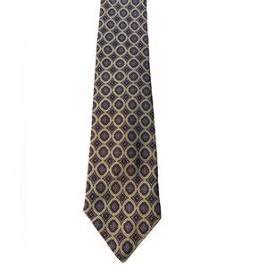 Klein vintage 100% silk tie. Tan with medallion pattern. Excellent condition.